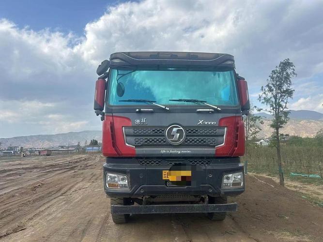 陕汽德龙x3000自卸车(陕汽德龙x3000自卸车86自重多少)